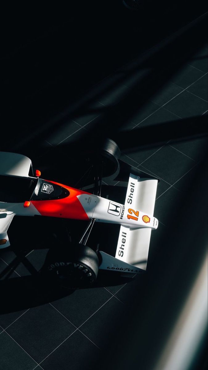 Shadow & Speed: Modern F1 Aerial Poster